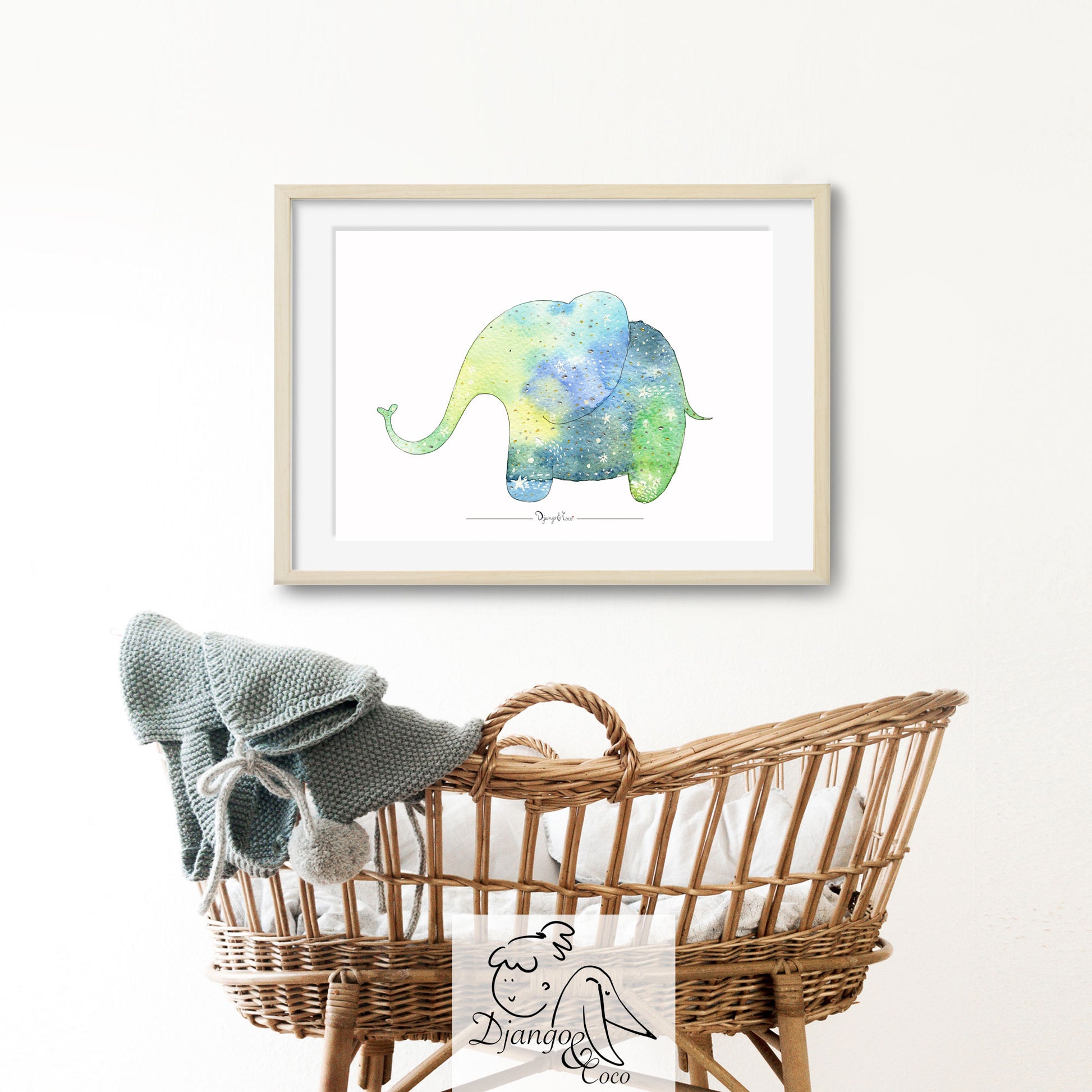 framed art of an elephant and a cradle