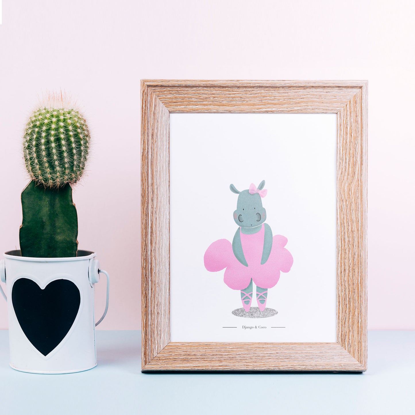 hippopotamus ballerina in a frame and a cactus